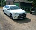 Белый Тойота Камри, объемом двигателя 2.5 л и пробегом 125 тыс. км за 12600 $, фото 1 на Automoto.ua
