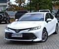 Белый Тойота Камри, объемом двигателя 2.5 л и пробегом 107 тыс. км за 21850 $, фото 1 на Automoto.ua