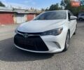 Белый Тойота Камри, объемом двигателя 2.5 л и пробегом 158 тыс. км за 16300 $, фото 1 на Automoto.ua