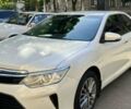 Белый Тойота Камри, объемом двигателя 2.49 л и пробегом 143 тыс. км за 20000 $, фото 1 на Automoto.ua