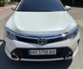 Белый Тойота Камри, объемом двигателя 2.5 л и пробегом 140 тыс. км за 16002 $, фото 1 на Automoto.ua