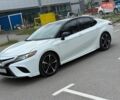 Белый Тойота Камри, объемом двигателя 2.49 л и пробегом 140 тыс. км за 18400 $, фото 1 на Automoto.ua
