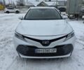 Белый Тойота Камри, объемом двигателя 2.49 л и пробегом 186 тыс. км за 26500 $, фото 1 на Automoto.ua