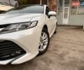 Белый Тойота Камри, объемом двигателя 2.49 л и пробегом 52 тыс. км за 23500 $, фото 1 на Automoto.ua