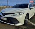 Белый Тойота Камри, объемом двигателя 2.49 л и пробегом 63 тыс. км за 23900 $, фото 1 на Automoto.ua