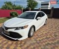 Білий Тойота Камрі, об'ємом двигуна 2.49 л та пробігом 110 тис. км за 19000 $, фото 1 на Automoto.ua