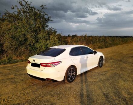 Белый Тойота Камри, объемом двигателя 2.5 л и пробегом 100 тыс. км за 22000 $, фото 1 на Automoto.ua