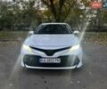 Белый Тойота Камри, объемом двигателя 2.49 л и пробегом 125 тыс. км за 25500 $, фото 1 на Automoto.ua