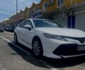 Белый Тойота Камри, объемом двигателя 2.5 л и пробегом 220 тыс. км за 16800 $, фото 1 на Automoto.ua