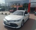 Белый Тойота Камри, объемом двигателя 2.5 л и пробегом 160 тыс. км за 18969 $, фото 1 на Automoto.ua