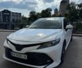 Белый Тойота Камри, объемом двигателя 2.49 л и пробегом 121 тыс. км за 23500 $, фото 1 на Automoto.ua