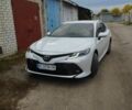 Белый Тойота Камри, объемом двигателя 2.5 л и пробегом 200 тыс. км за 18500 $, фото 1 на Automoto.ua