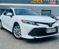Белый Тойота Камри, объемом двигателя 2.49 л и пробегом 144 тыс. км за 18000 $, фото 1 на Automoto.ua