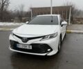 Белый Тойота Камри, объемом двигателя 2.5 л и пробегом 123 тыс. км за 20900 $, фото 1 на Automoto.ua