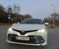 Белый Тойота Камри, объемом двигателя 2.49 л и пробегом 80 тыс. км за 27500 $, фото 1 на Automoto.ua