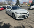 Білий Тойота Камрі, об'ємом двигуна 2.5 л та пробігом 127 тис. км за 25700 $, фото 1 на Automoto.ua