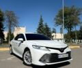 Белый Тойота Камри, объемом двигателя 2.49 л и пробегом 141 тыс. км за 25999 $, фото 1 на Automoto.ua
