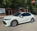 Белый Тойота Камри, объемом двигателя 2.49 л и пробегом 33 тыс. км за 23700 $, фото 1 на Automoto.ua