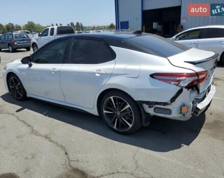 Белый Тойота Камри, объемом двигателя 2.49 л и пробегом 128 тыс. км за 18470 $, фото 1 на Automoto.ua