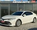 Белый Тойота Камри, объемом двигателя 2.49 л и пробегом 240 тыс. км за 25000 $, фото 1 на Automoto.ua
