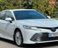 Белый Тойота Камри, объемом двигателя 2.5 л и пробегом 198 тыс. км за 24800 $, фото 1 на Automoto.ua