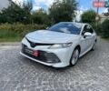 Белый Тойота Камри, объемом двигателя 2.5 л и пробегом 181 тыс. км за 25340 $, фото 1 на Automoto.ua
