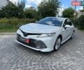 Белый Тойота Камри, объемом двигателя 2.5 л и пробегом 181 тыс. км за 25490 $, фото 1 на Automoto.ua
