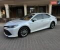 Белый Тойота Камри, объемом двигателя 2.49 л и пробегом 200 тыс. км за 18500 $, фото 1 на Automoto.ua