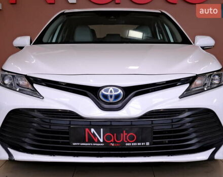 Белый Тойота Камри, объемом двигателя 2.5 л и пробегом 140 тыс. км за 21900 $, фото 1 на Automoto.ua
