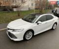 Белый Тойота Камри, объемом двигателя 2.49 л и пробегом 63 тыс. км за 23500 $, фото 1 на Automoto.ua