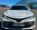 Білий Тойота Камрі, об'ємом двигуна 2.49 л та пробігом 181 тис. км за 25000 $, фото 1 на Automoto.ua