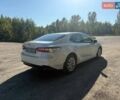 Белый Тойота Камри, объемом двигателя 2.49 л и пробегом 33 тыс. км за 23700 $, фото 1 на Automoto.ua