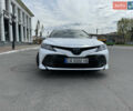 Белый Тойота Камри, объемом двигателя 2.49 л и пробегом 102 тыс. км за 22999 $, фото 1 на Automoto.ua