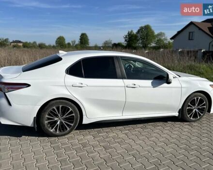 Белый Тойота Камри, объемом двигателя 2.49 л и пробегом 115 тыс. км за 21000 $, фото 7 на Automoto.ua