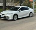 Белый Тойота Камри, объемом двигателя 2.49 л и пробегом 59 тыс. км за 30500 $, фото 1 на Automoto.ua
