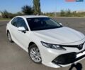 Белый Тойота Камри, объемом двигателя 2.5 л и пробегом 50 тыс. км за 28500 $, фото 1 на Automoto.ua