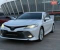 Белый Тойота Камри, объемом двигателя 2.49 л и пробегом 205 тыс. км за 24300 $, фото 1 на Automoto.ua