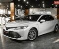 Белый Тойота Камри, объемом двигателя 2.49 л и пробегом 56 тыс. км за 30900 $, фото 1 на Automoto.ua