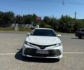 Белый Тойота Камри, объемом двигателя 2.49 л и пробегом 170 тыс. км за 25000 $, фото 1 на Automoto.ua