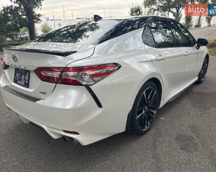 Белый Тойота Камри, объемом двигателя 2.49 л и пробегом 87 тыс. км за 15500 $, фото 2 на Automoto.ua