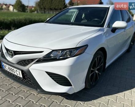 Белый Тойота Камри, объемом двигателя 2.49 л и пробегом 115 тыс. км за 21000 $, фото 1 на Automoto.ua