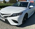 Белый Тойота Камри, объемом двигателя 2.49 л и пробегом 115 тыс. км за 21000 $, фото 1 на Automoto.ua