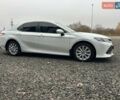 Белый Тойота Камри, объемом двигателя 2.49 л и пробегом 173 тыс. км за 20500 $, фото 1 на Automoto.ua