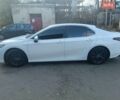 Белый Тойота Камри, объемом двигателя 2.49 л и пробегом 131 тыс. км за 34900 $, фото 1 на Automoto.ua