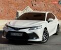 Белый Тойота Камри, объемом двигателя 2.49 л и пробегом 157 тыс. км за 28000 $, фото 1 на Automoto.ua