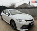 Белый Тойота Камри, объемом двигателя 2.49 л и пробегом 106 тыс. км за 33000 $, фото 1 на Automoto.ua