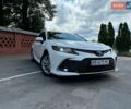 Белый Тойота Камри, объемом двигателя 2.49 л и пробегом 152 тыс. км за 21700 $, фото 1 на Automoto.ua