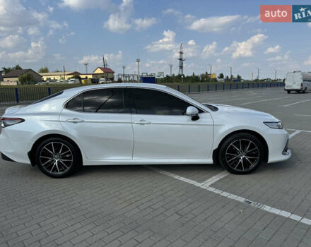 Белый Тойота Камри, объемом двигателя 2.49 л и пробегом 85 тыс. км за 30999 $, фото 1 на Automoto.ua