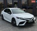 Белый Тойота Камри, объемом двигателя 2.49 л и пробегом 87 тыс. км за 23900 $, фото 1 на Automoto.ua