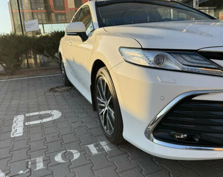 Белый Тойота Камри, объемом двигателя 2.49 л и пробегом 95 тыс. км за 32000 $, фото 1 на Automoto.ua